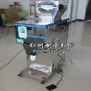 小型颗粒分装机 称重式颗粒包装机 种子定量包装机