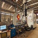 国盛5032龙门加工中心发那科MF系统方滑枕齿轮头工作台.