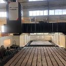 纽威PM3060HZ。工作台3X6米，门宽3.8米，门高1.6米。.